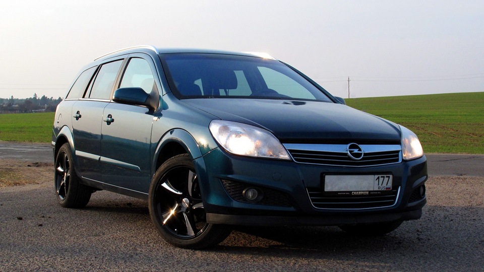 opel astra j sedan спереди